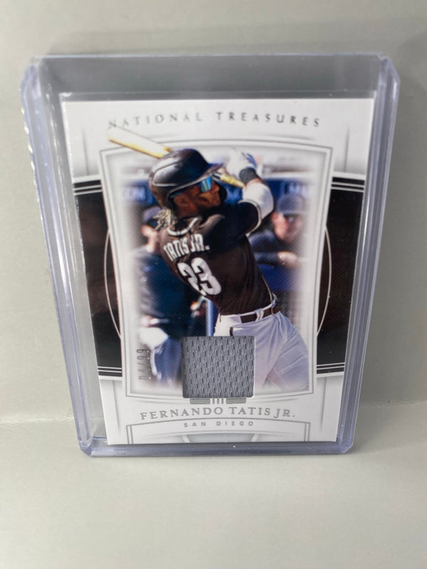 2020 Panini National Treasures Fernando Tatis Jr. #100 player-worn material 04/99 front