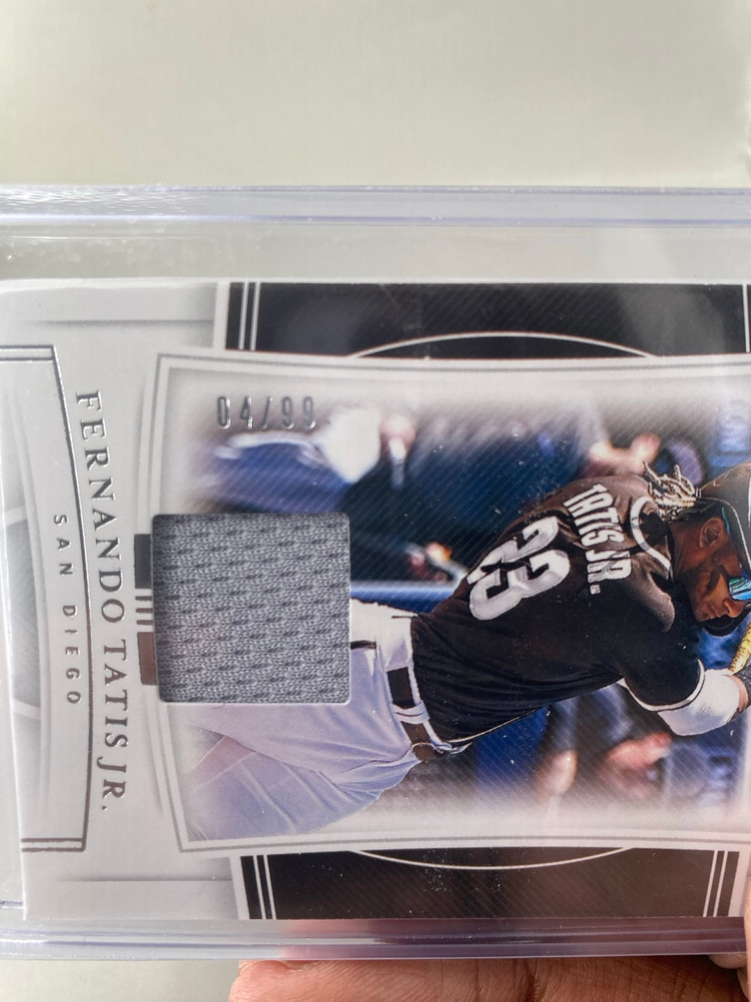 Fernando Tatis Jr. National Treasures #100 serial number 04/99 close-up